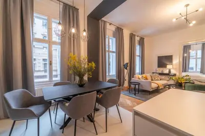 Ein Sitzbereich in der Unterkunft josef's home I Pink Flamingo I Deluxe Suite