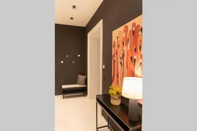 Ein Sitzbereich in der Unterkunft josef's home I Pink Flamingo I Deluxe Suite