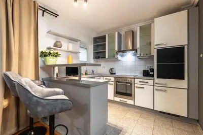 Küche/Küchenzeile in der Unterkunft Live Centrally in a Spacious and Modern Apartment in Vienna