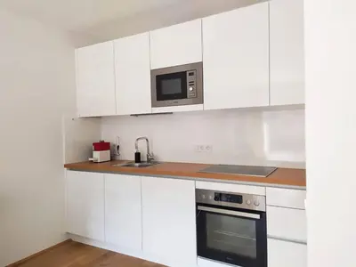 Küche/Küchenzeile in der Unterkunft Deluxe Parkapartment Vienna City Center - free parking!