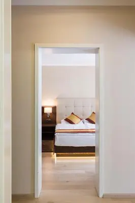Ein Bett oder Betten in einem Zimmer der Unterkunft Hotel Sacher Baden