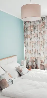 Ein Bett oder Betten in einem Zimmer der Unterkunft Zentrum 2 Mörbisch
