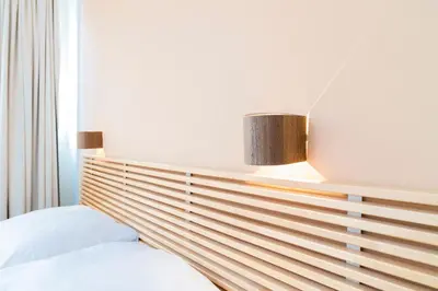 Ein Bett oder Betten in einem Zimmer der Unterkunft Apartments Favoriten