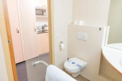 Ein Badezimmer in der Unterkunft Apartments Favoriten