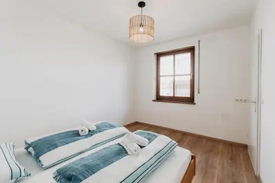 Ein Bett oder Betten in einem Zimmer der Unterkunft Ferienhaus Schilfvilla
