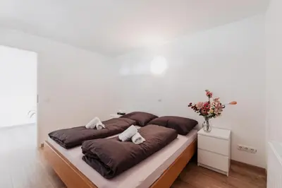 Ein Bett oder Betten in einem Zimmer der Unterkunft Ferienhaus Schilfvilla