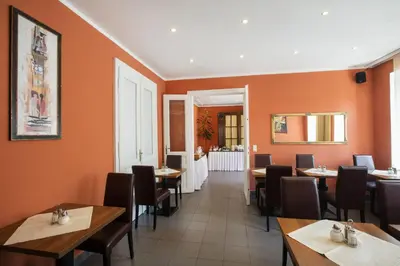 Ein Restaurant oder anderes Speiselokal in der Unterkunft Hahn Hotel Vienna