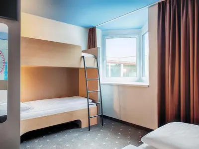 Ein Bett oder Betten in einem Zimmer der Unterkunft B&B Hotel Wien-Meidling