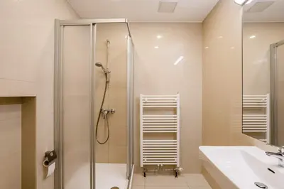 Ein Badezimmer in der Unterkunft Beautiful Apartment 3 City Center