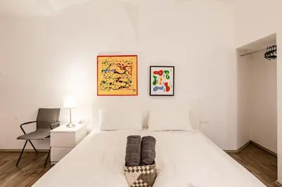 Ein Bett oder Betten in einem Zimmer der Unterkunft Beautiful Apartment 3 City Center