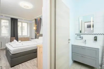 Ein Badezimmer in der Unterkunft Palais Pálffy Apartments Vienna