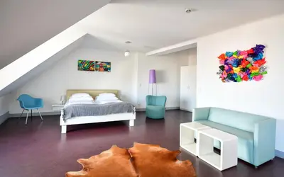 Ein Bett oder Betten in einem Zimmer der Unterkunft Stanys - Das Apartmenthotel
