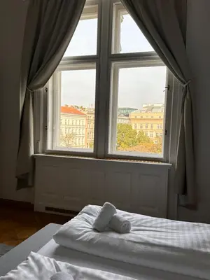 Ein Bett oder Betten in einem Zimmer der Unterkunft Parkview Rudolfsplatz