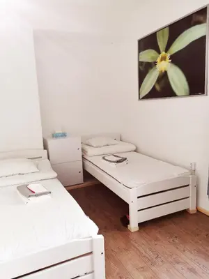 Ein Bett oder Betten in einem Zimmer der Unterkunft 7brunnen Hostel Beds & Rooms