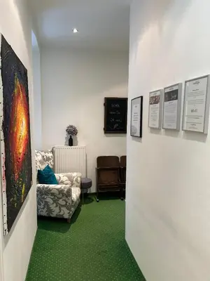 Ein Sitzbereich in der Unterkunft Pension Stadthalle