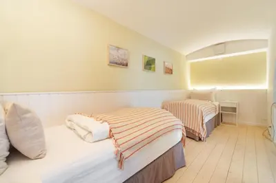 Ein Bett oder Betten in einem Zimmer der Unterkunft Vorgarten Apartments - central, new and stylish for your comfortable stay in Vienna