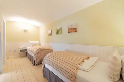 Ein Bett oder Betten in einem Zimmer der Unterkunft Vorgarten Apartments - central, new and stylish for your comfortable stay in Vienna