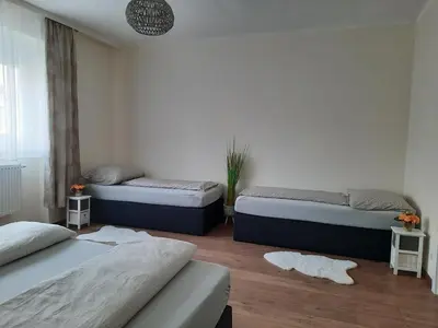 Ein Bett oder Betten in einem Zimmer der Unterkunft Ferienhaus Lina