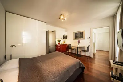 Ein Bett oder Betten in einem Zimmer der Unterkunft Schlossquadrat Apartment 8