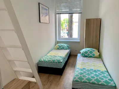 Ein Bett oder Betten in einem Zimmer der Unterkunft Raisa Apartments Lerchenfelder Gürtel 30