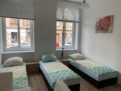 Ein Bett oder Betten in einem Zimmer der Unterkunft Raisa Apartments Lerchenfelder Gürtel 30