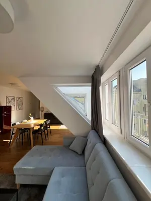 Ein Sitzbereich in der Unterkunft DOWA Apartments