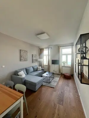 Ein Sitzbereich in der Unterkunft DOWA Apartments