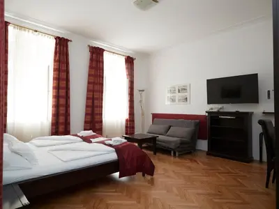 Ein Bett oder Betten in einem Zimmer der Unterkunft Vienna Studio Apartments