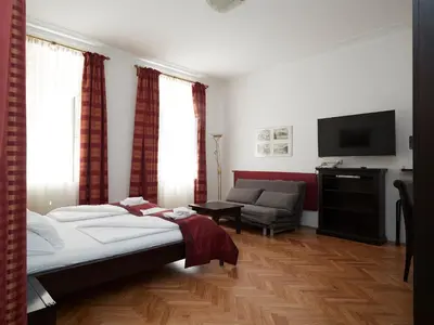Ein Bett oder Betten in einem Zimmer der Unterkunft Vienna Studio Apartments