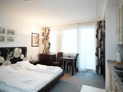 Ein Bett oder Betten in einem Zimmer der Unterkunft Vienna Studio Apartments