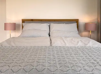 Ein Bett oder Betten in einem Zimmer der Unterkunft Haderer's Home - Bad Vöslau near Vienna