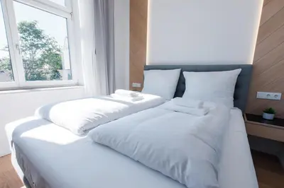 Ein Bett oder Betten in einem Zimmer der Unterkunft Zeus Design Apartments Unique #36
