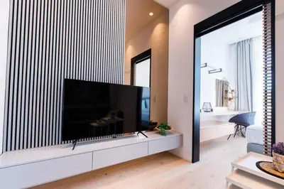 TV/Unterhaltungsangebot in der Unterkunft Zeus Design Apartments Unique #36