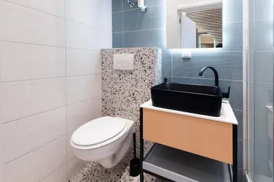Ein Badezimmer in der Unterkunft Zeus Design Apartments Unique #36