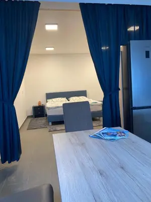 Ein Bett oder Betten in einem Zimmer der Unterkunft Sandy’s Home