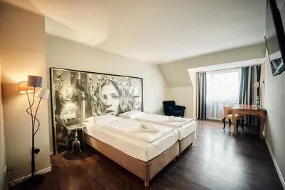 Ein Bett oder Betten in einem Zimmer der Unterkunft Hotel Calmo
