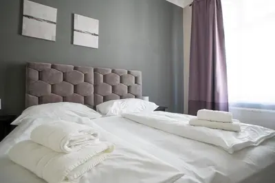 Ein Bett oder Betten in einem Zimmer der Unterkunft Brand new luxury 2 bedroom apartment near augarten