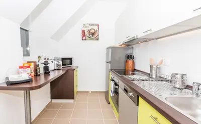 Küche/Küchenzeile in der Unterkunft Simtown Suite Apartments