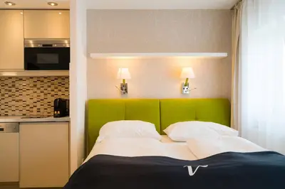 Ein Bett oder Betten in einem Zimmer der Unterkunft Vienna Residence, Rochusmarkt - Wien Mitte