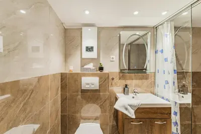 Ein Badezimmer in der Unterkunft ZEUS Design Mini Apartment Erlach #10