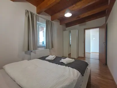 Ein Bett oder Betten in einem Zimmer der Unterkunft BeeHome Apartment