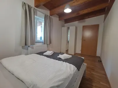 Ein Bett oder Betten in einem Zimmer der Unterkunft BeeHome Apartment