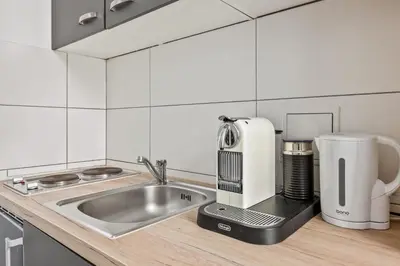 Küche/Küchenzeile in der Unterkunft Gemütliche Wohnung Wien Stadthalle