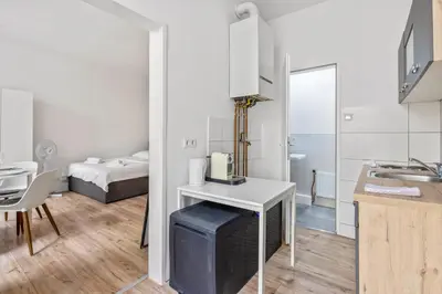 Ein Bett oder Betten in einem Zimmer der Unterkunft Gemütliche Wohnung Wien Stadthalle