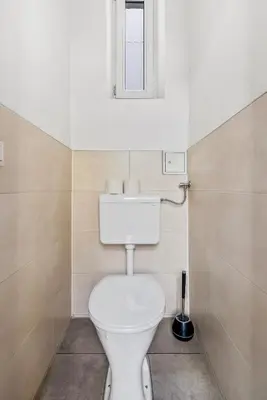 Ein Badezimmer in der Unterkunft Gemütliche Wohnung Wien Stadthalle