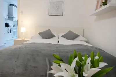 Ein Bett oder Betten in einem Zimmer der Unterkunft Stylish City Apartments Vienna