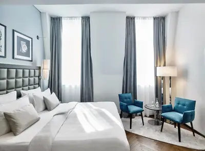 Ein Bett oder Betten in einem Zimmer der Unterkunft Steigenberger Hotel Herrenhof