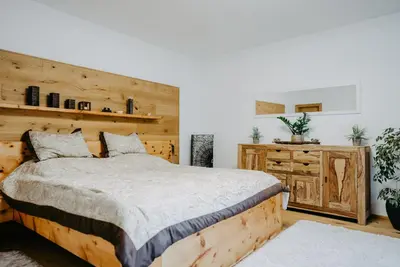 Ein Bett oder Betten in einem Zimmer der Unterkunft Apartment RADO 75m2 mit Garten und Terrasse