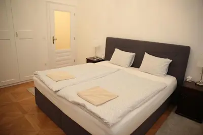 Ein Bett oder Betten in einem Zimmer der Unterkunft Heart of Vienna- next to Albertina