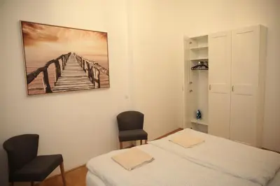Ein Bett oder Betten in einem Zimmer der Unterkunft Heart of Vienna- next to Albertina